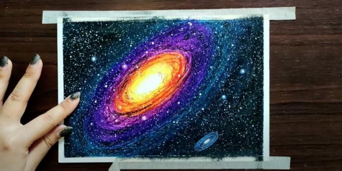 Come disegnare lo spazio con i pastelli: dipingi un ovale e dei cerchi