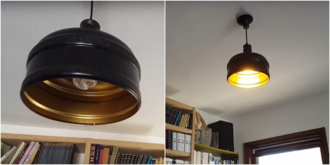 Lampadario con le mani da una bottiglia di plastica