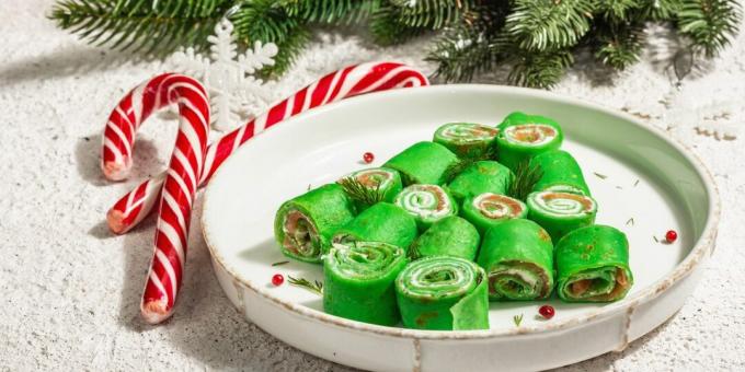 Antipasto luminoso per il nuovo anno. Frittelle con spinaci e pesce rosso